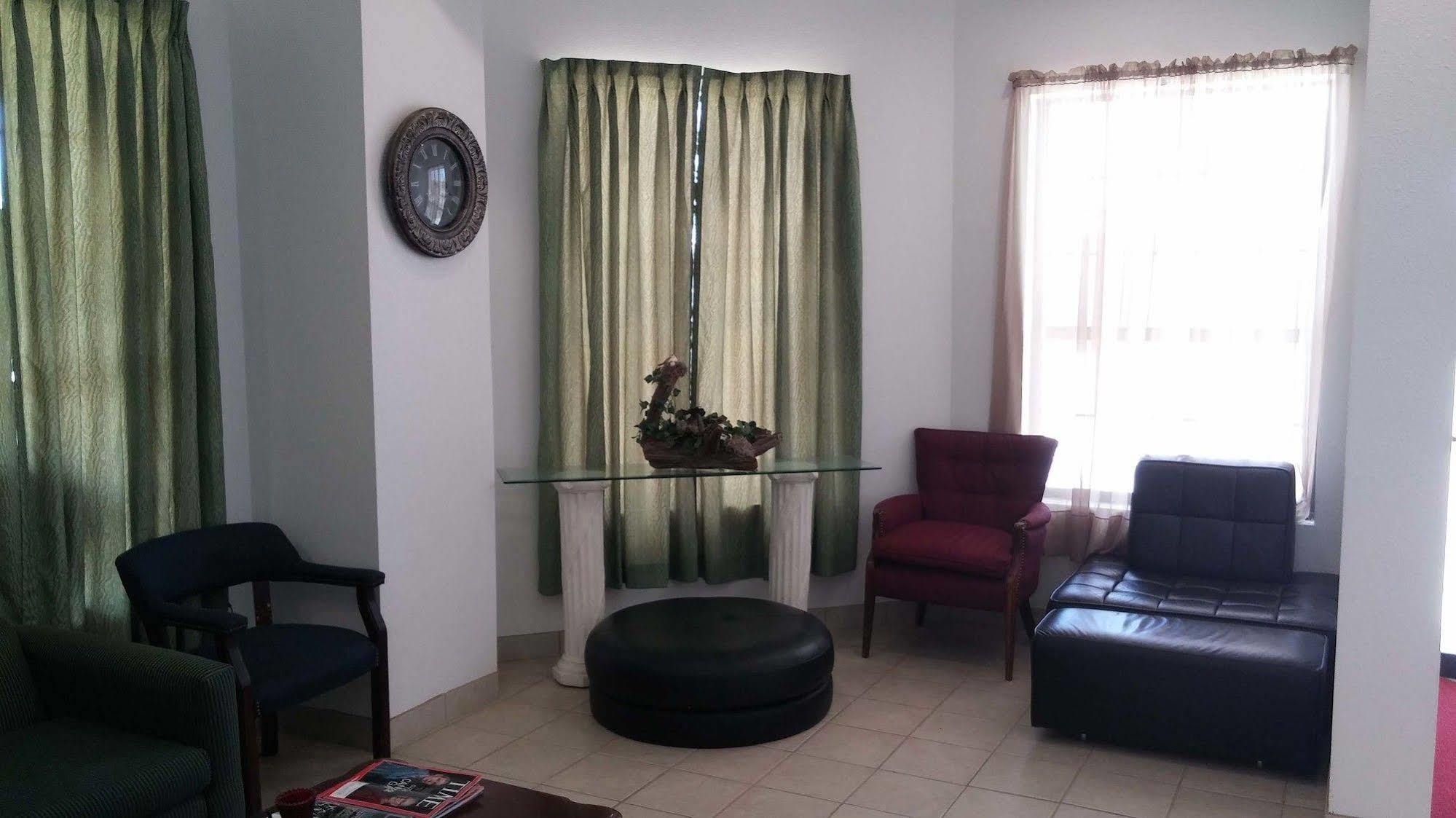 Country Regency Inn & Suites Manvel Экстерьер фото